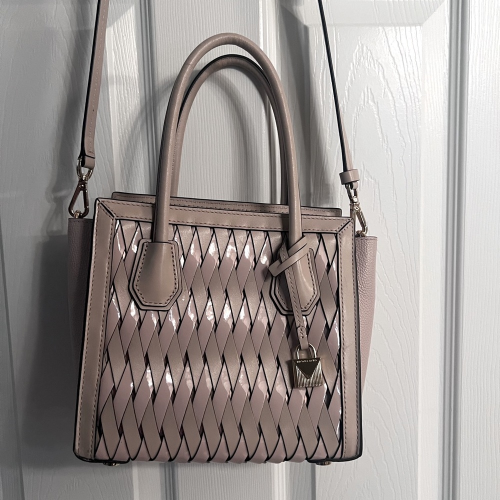 Mauve with gold zipper and lock